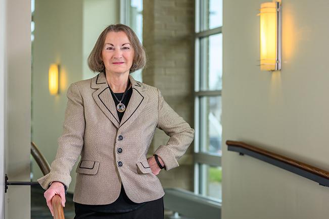 Eileen Clinton in hallway on campus